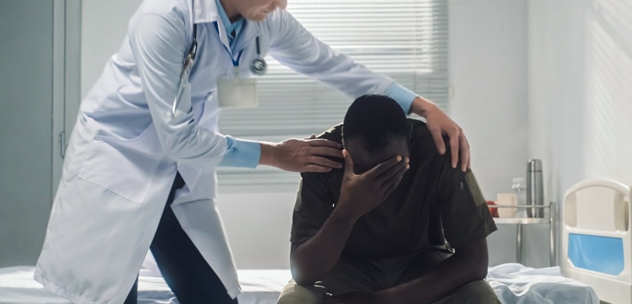 Person speaking with mental health professional